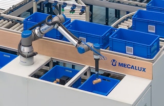 Robot do kompletacji Mecaluxu całkowicie automatyzuje proces przygotowywania zamówień Robot do kompletacji Mecaluxu całkowicie automatyzuje proces przygotowywania zamówień